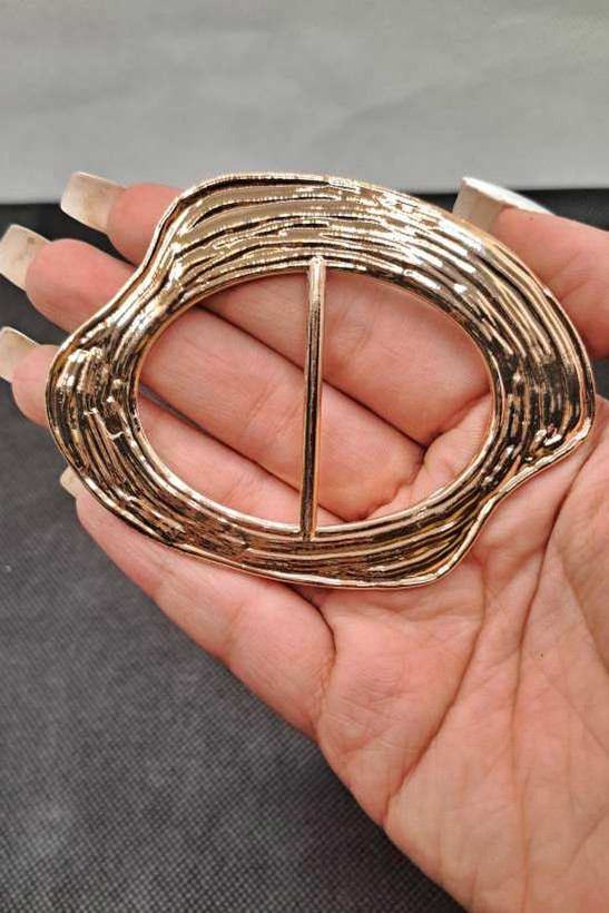 سگک فلزی دفرمه